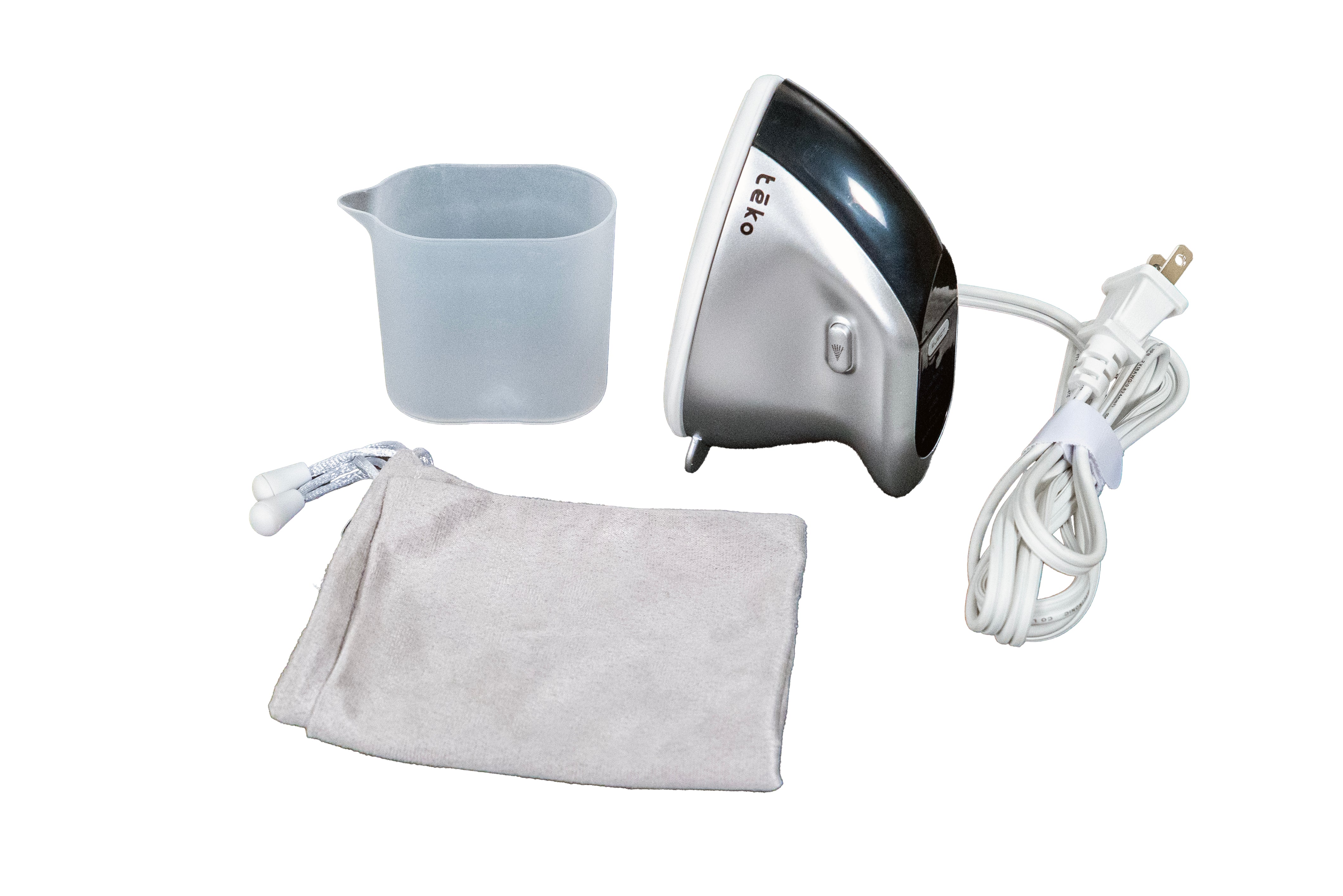 A compact electric steamer iron set on a white background, including a silver and black steamer head, white cord with plug, a translucent plastic cup, a light gray drawstring pouch, and a white fabric cleaning cloth.