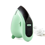A TEKO personal massager shown on a white background with its power cord. The device has a mint green body with a black top panel and a small green KETO logo.