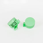 A pair of light mint green plastic fans.